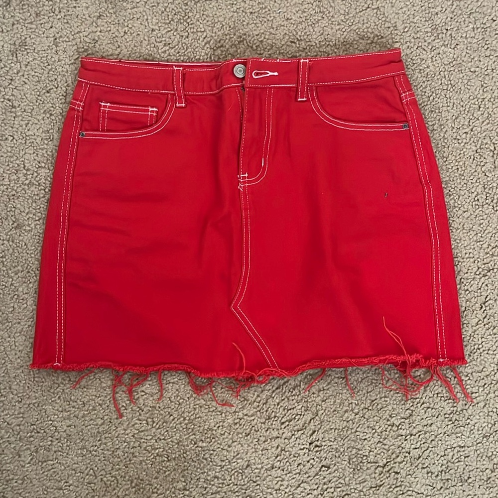 Red denim skirt with white stitching